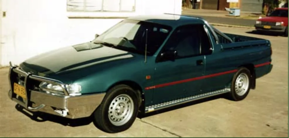 An early Camesco build: a green ute fitted with a custom aluminium bullbar and side steps, Coffs Harbour, early 1990s